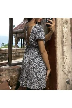 Robe Noire Motif Liberty évasé Avec Bouton -Féminité Couture robe noire motif liberty evase avec bouton 2