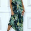 Sublime Robe Noir Motif Feuille Verte Avec Bretelle Et Volant. Vêtement Mode Femme -Féminité Couture sublime robe noir motif feuille verte avec bretelle et volant vetement mode femme